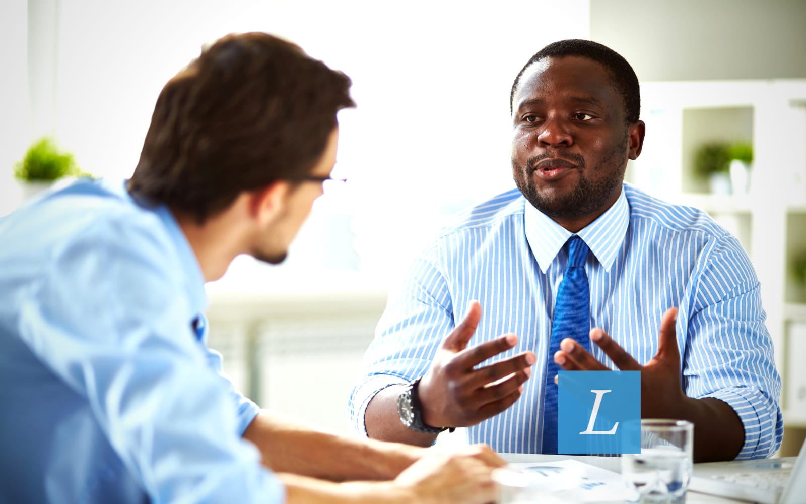 Main image of post about 10 tips on how to get rid of your foreign language, showing two persons talking.